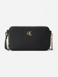 Calvin Klein Accessories naisten laukku, MINIMAL MONO CAMERA BAG Musta