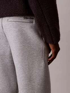 Calvin Klein Jeans miesten collegehousut Cotton Spacer Jogger, vaaleanharmaa