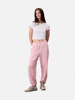 Calvin Klein Jeans naisten collegehousut MONOLOGO FRENCH TERRY JOGGER, vaaleanpunainen