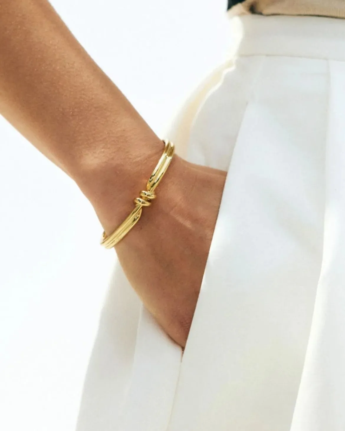 Edblad rannekoru Swivel Bangle, Gold pleated