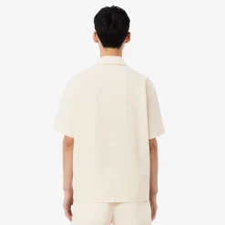 Lacoste miesten lyhythihainen kauluspaita Relaxed Fit Waffle Texture Shirt, valkoinen