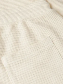Tommy Jeans miesten collegeshortsit Waffled Beach Short, kerma